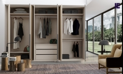 Hinged fitted wardrobe in cashmere high gloss finish with black profile handles_1 (1).jpg
