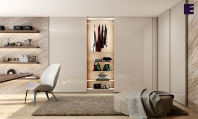 Bespoke fitted frameless sliding door wardrobe in L shape with Light Grey high gloss finish.jpg
