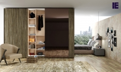 Fitted Sliding Wardrobe with frameless Top hung Doors in  Combination of Metallo  and Emerald-Copper Mirror(1).jpg
